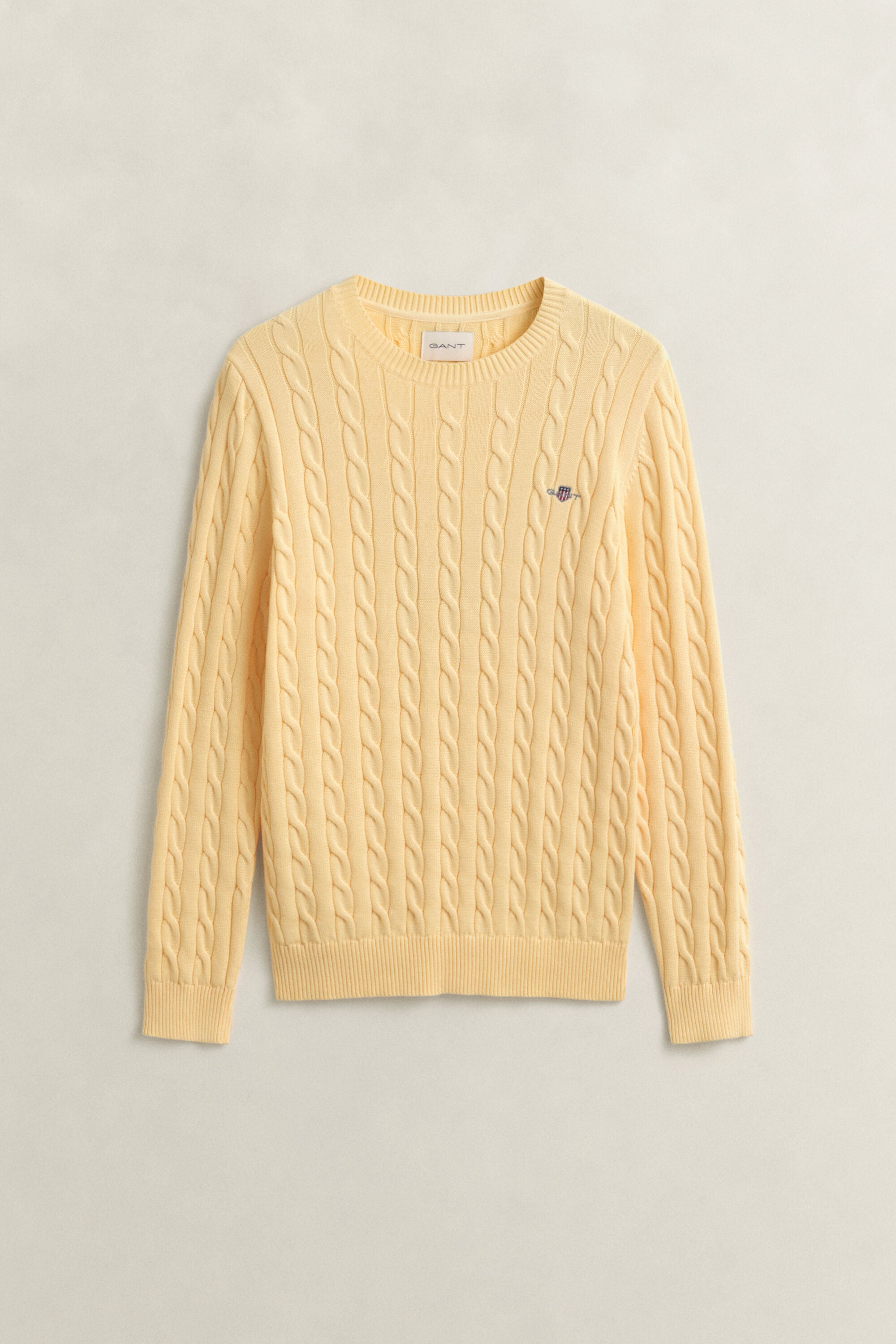 Crewneck sweater af bomuld med kabelstrik