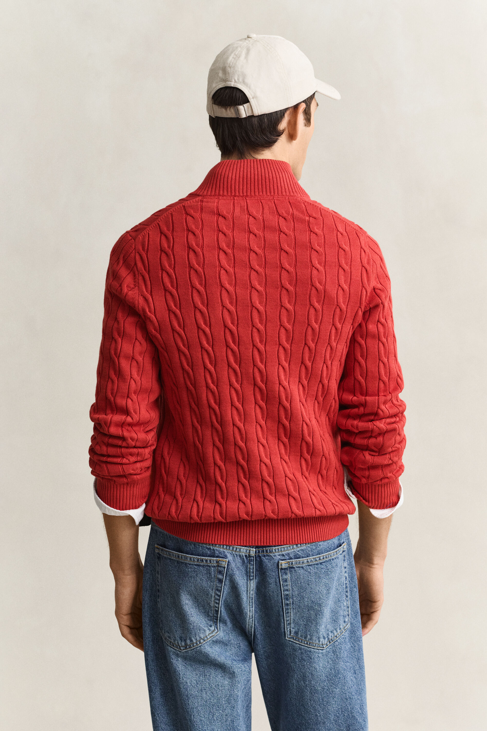 Kabelstrikket sweater af bomuld med halv lynlås