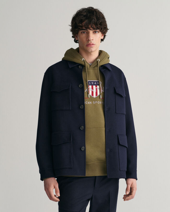 Håndsyet jakke med 4 lommer