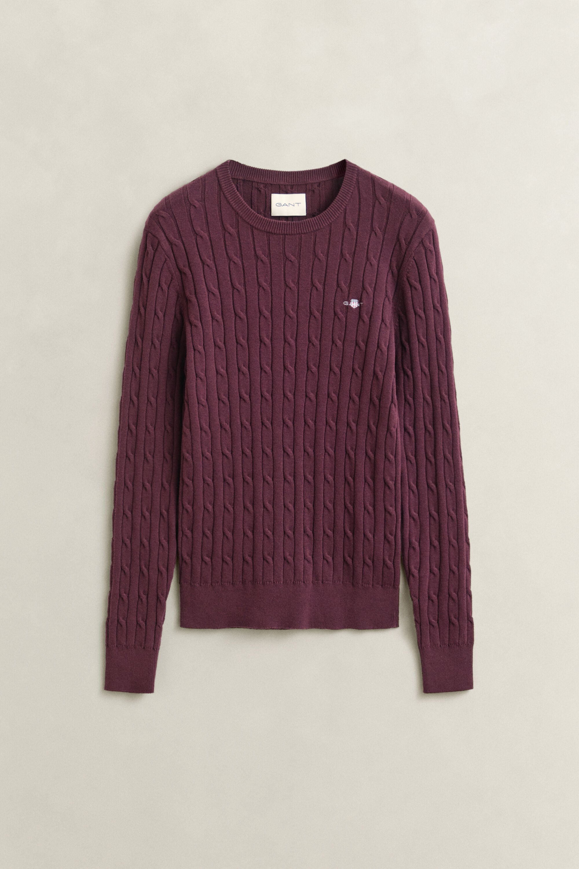 Crewneck sweater af strækbomuld med kabelstrik