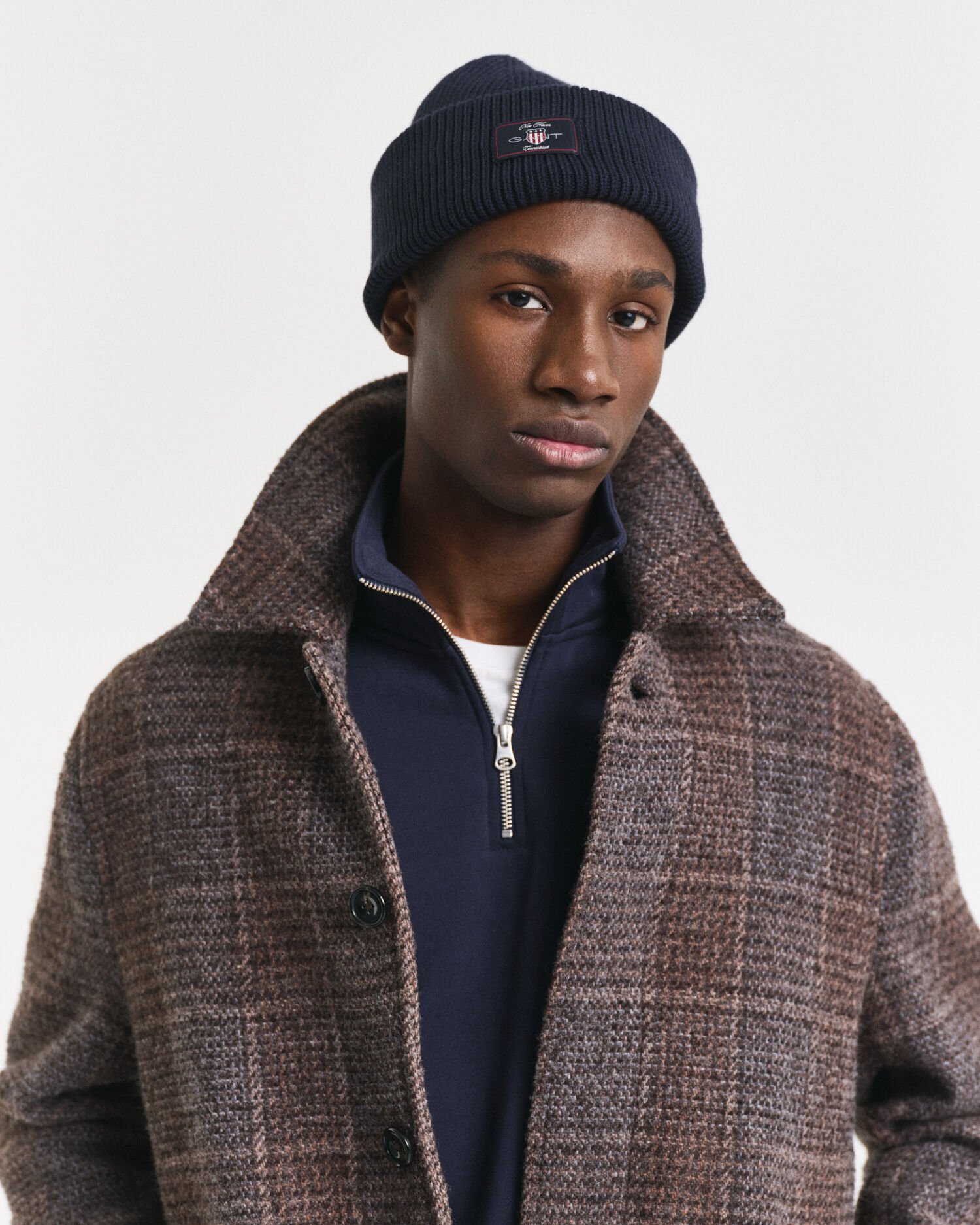 Ribstrikket beanie af bomuldsblanding