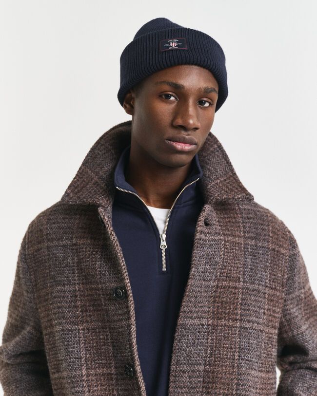 Ribstrikket beanie af bomuldsblanding