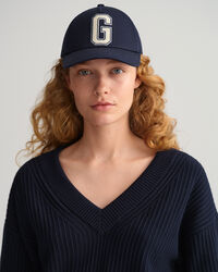 Ribstrikket sweater med V-hals i bomuld