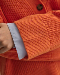 Ribstrikket cardigan af uld