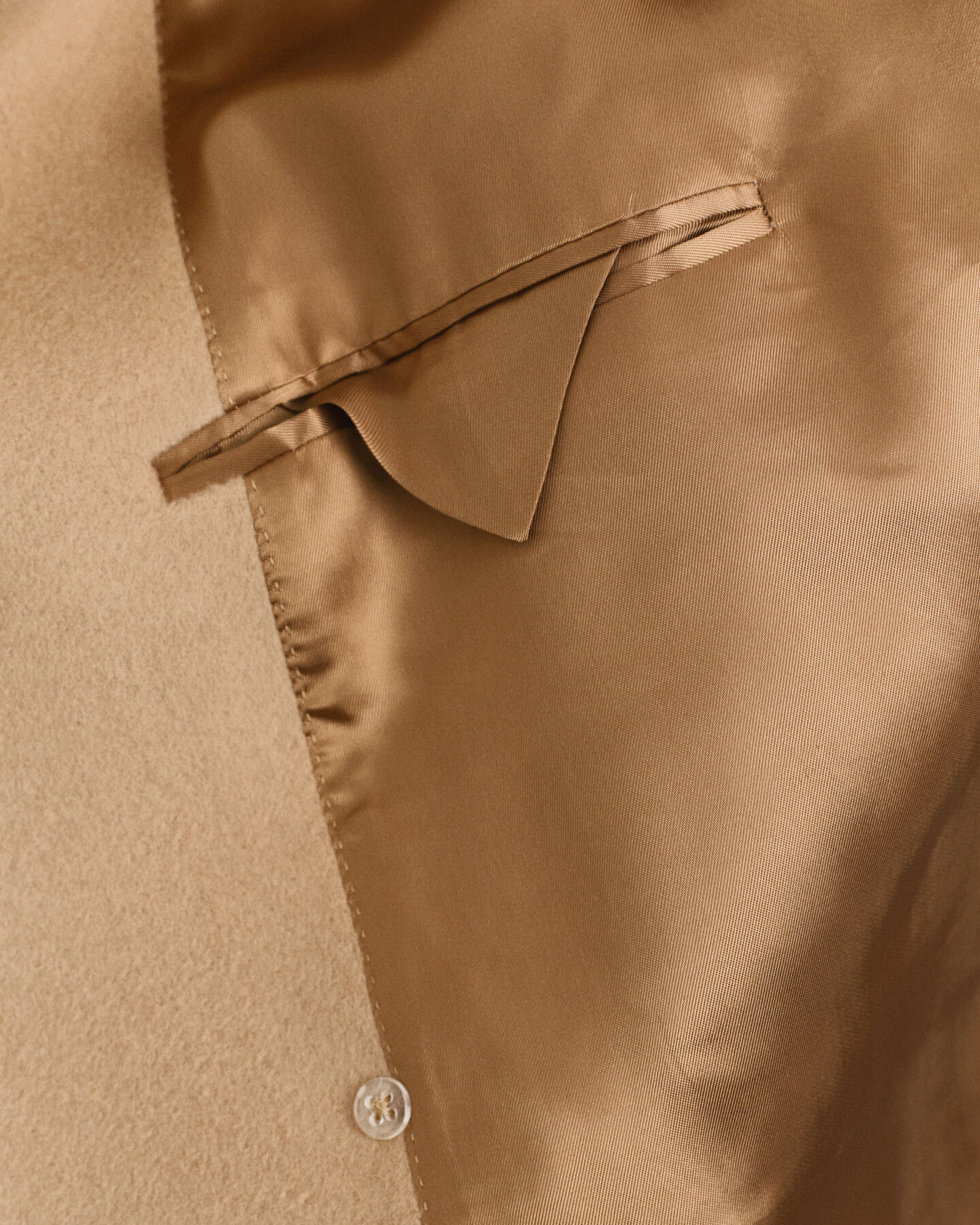 Dobbeltradet uldfrakke