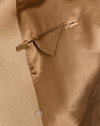 Dobbeltradet uldfrakke