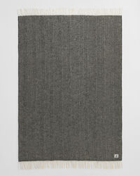 Sildebensmønstret uldtæppe