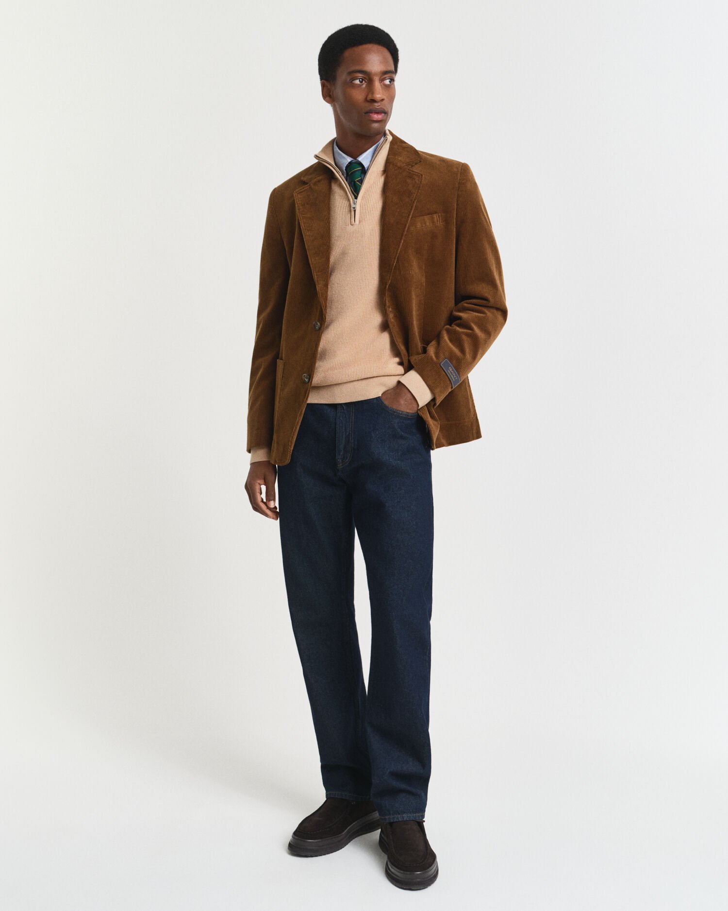 Ribstrikket sweater af bomuld og merinould med halv lynlås