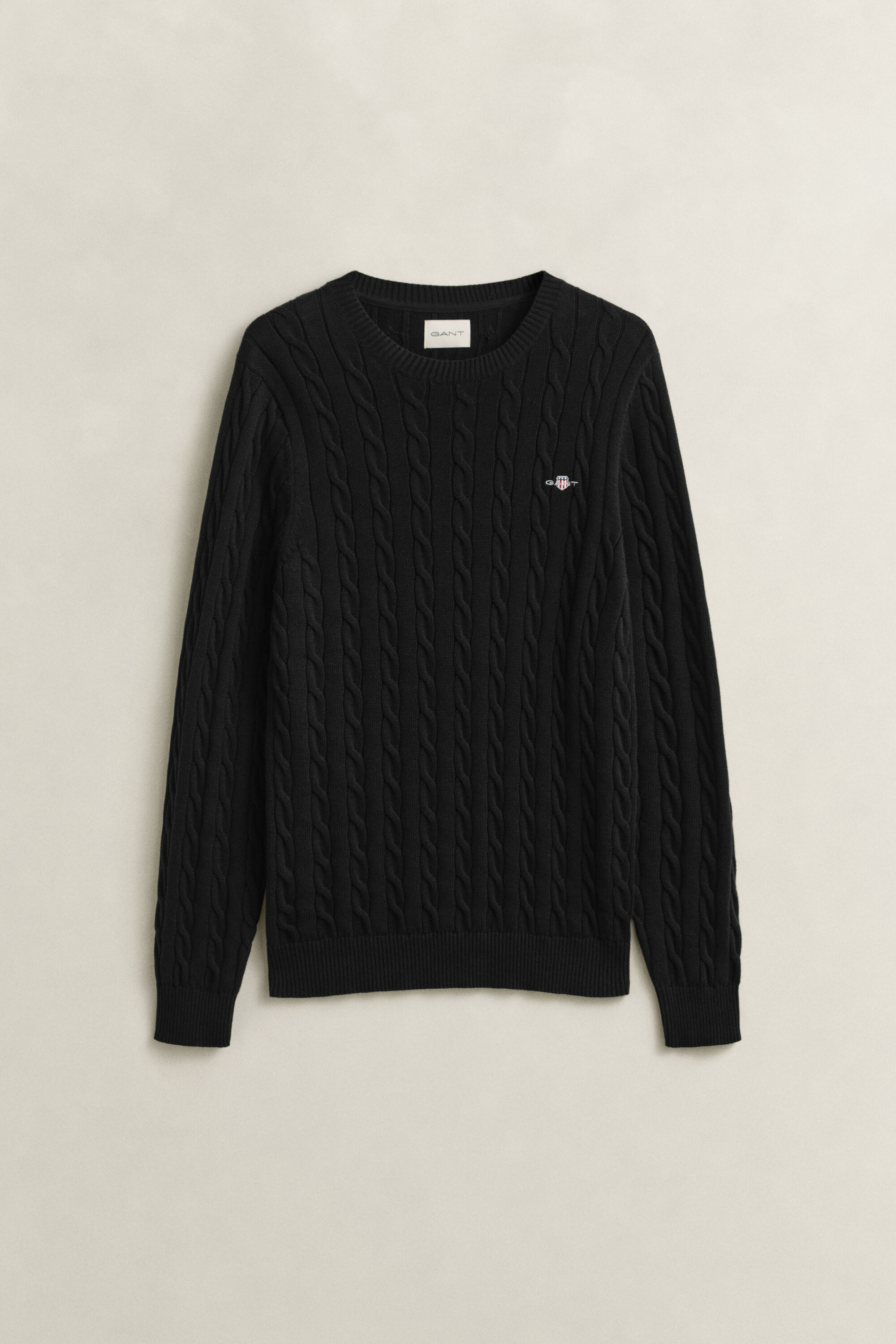 Crewneck sweater af bomuld med kabelstrik