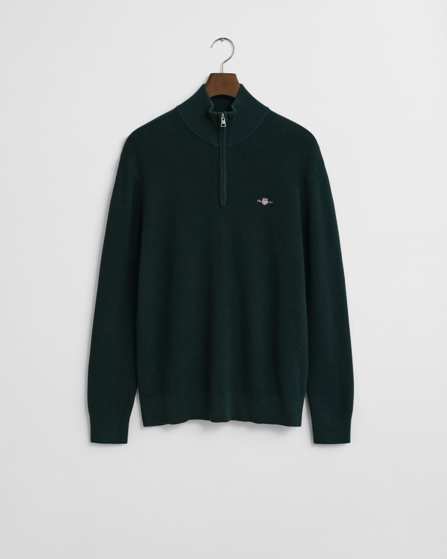 Ribstrikket sweater af bomuld og merinould med halv lynlås