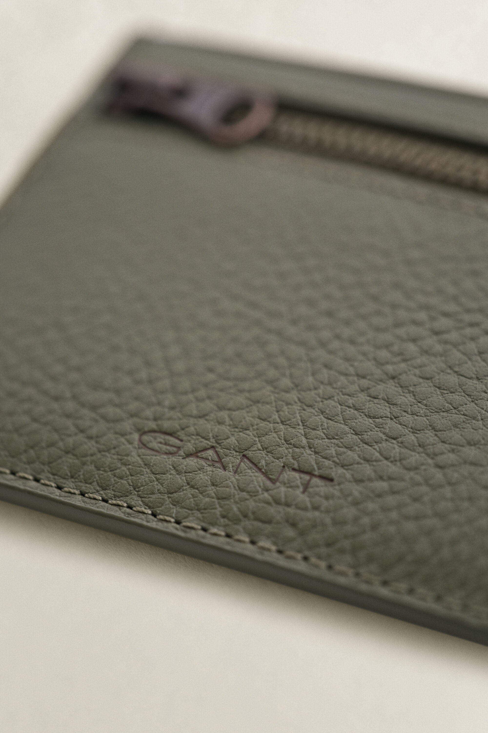 Kortpung i præget læder