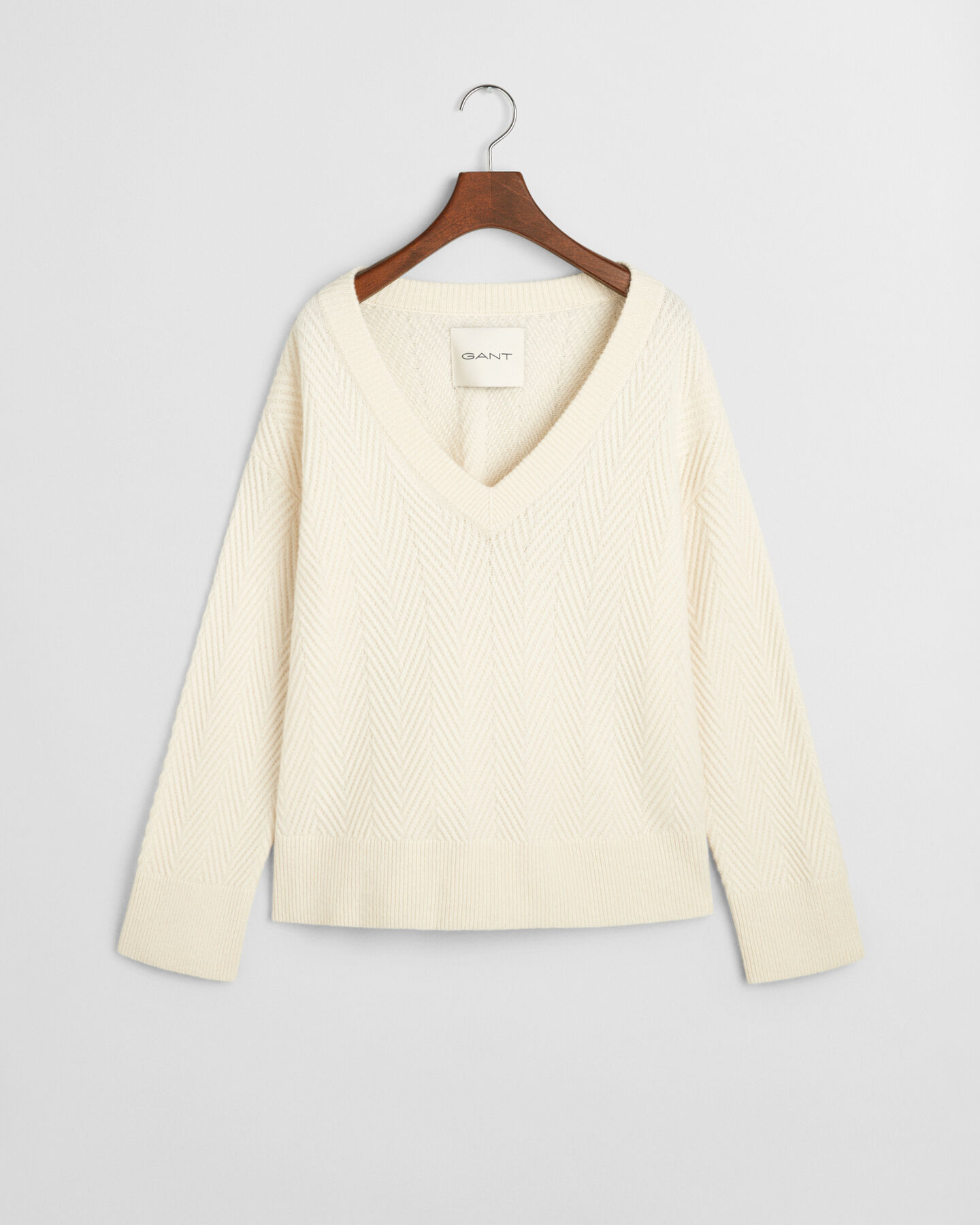 Sildebensm&oslash;nstret sweater med V-hals