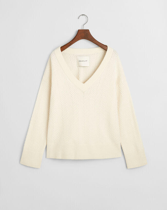 Sildebensm&oslash;nstret sweater med V-hals