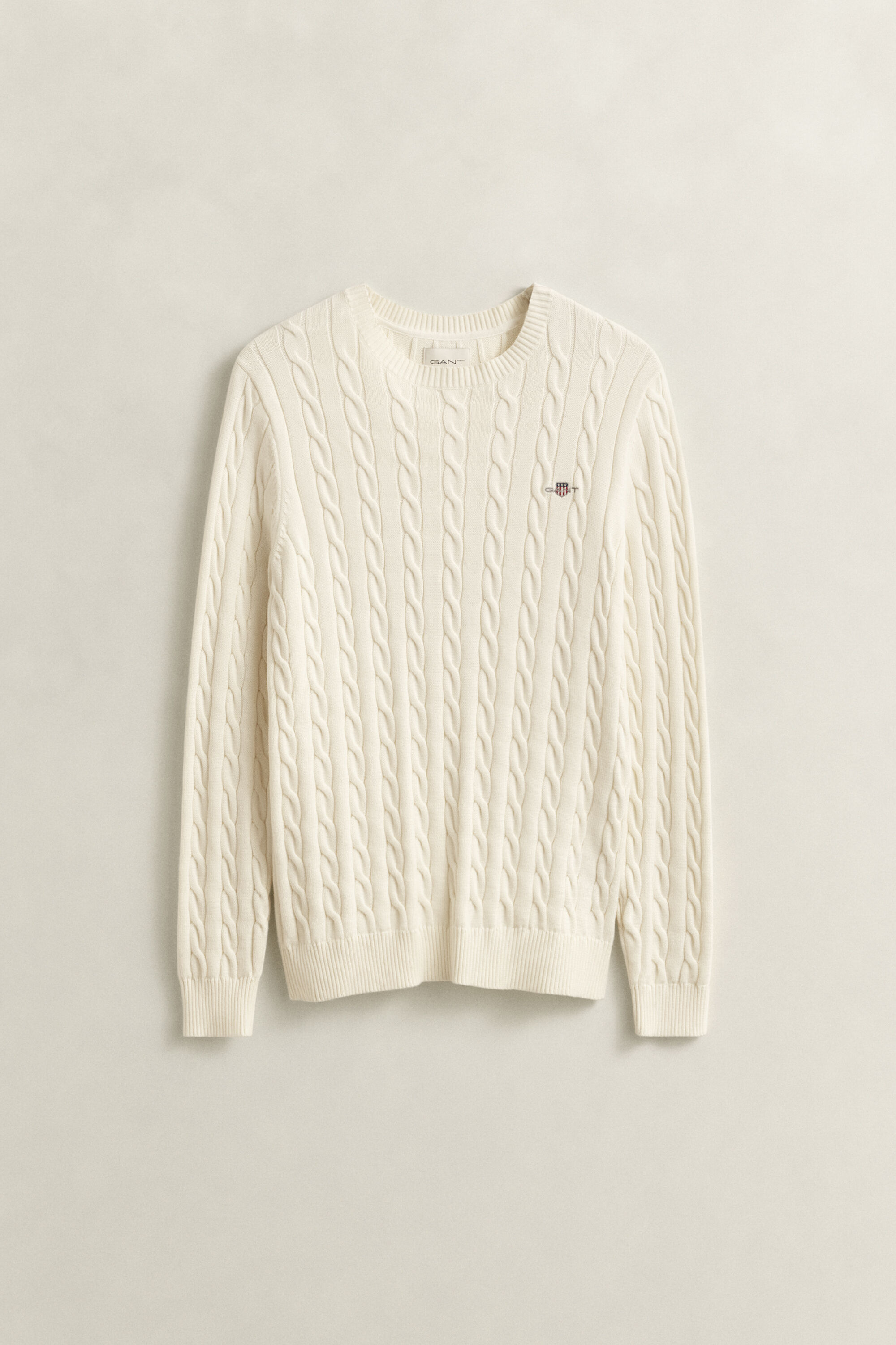 Crewneck sweater af bomuld med kabelstrik