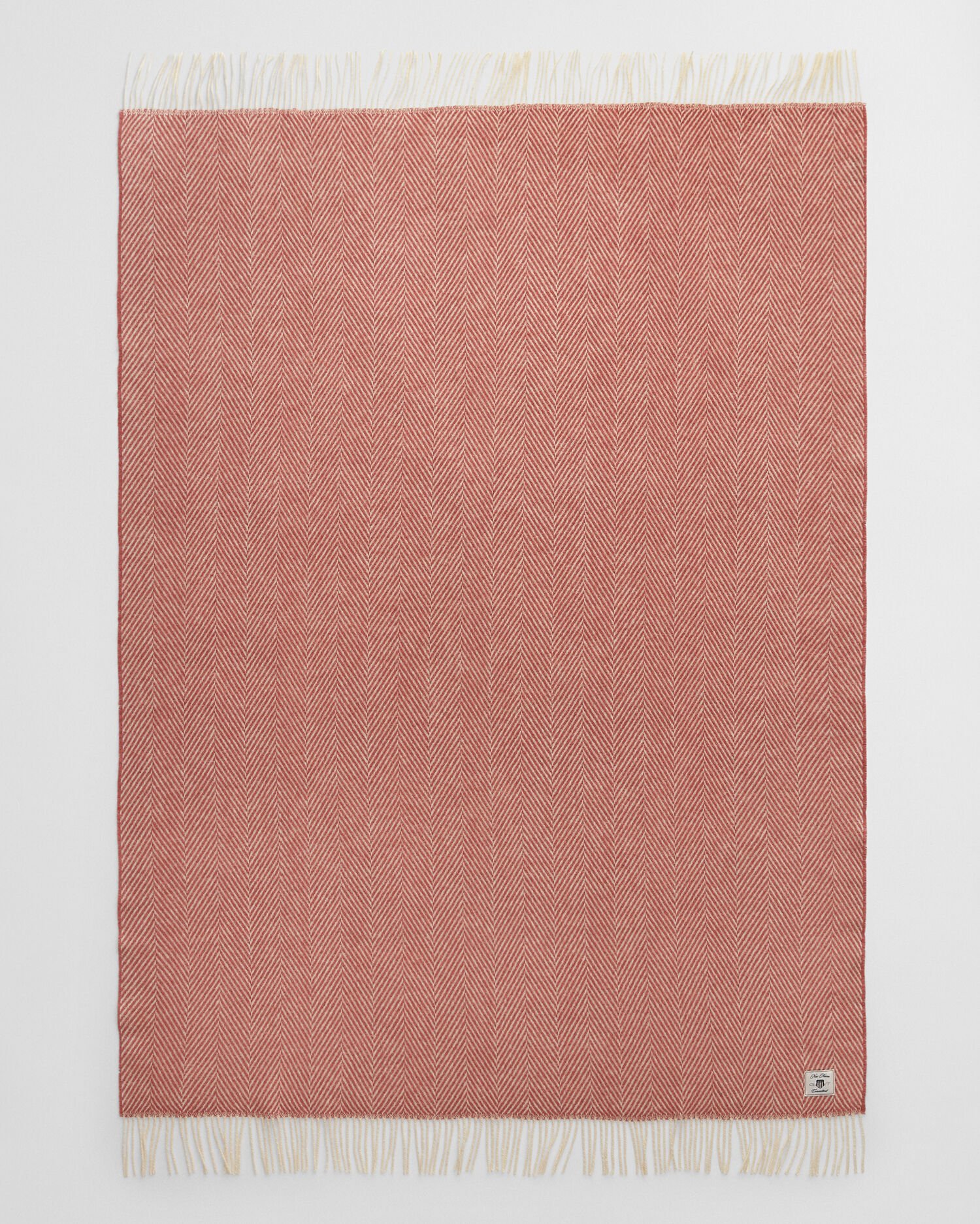 Sildebensmønstret uldtæppe