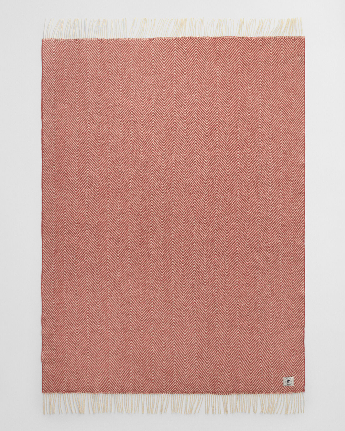 Sildebensmønstret uldtæppe