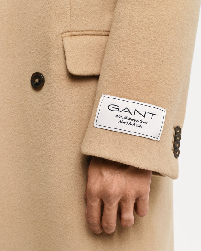 Dobbeltradet uldfrakke