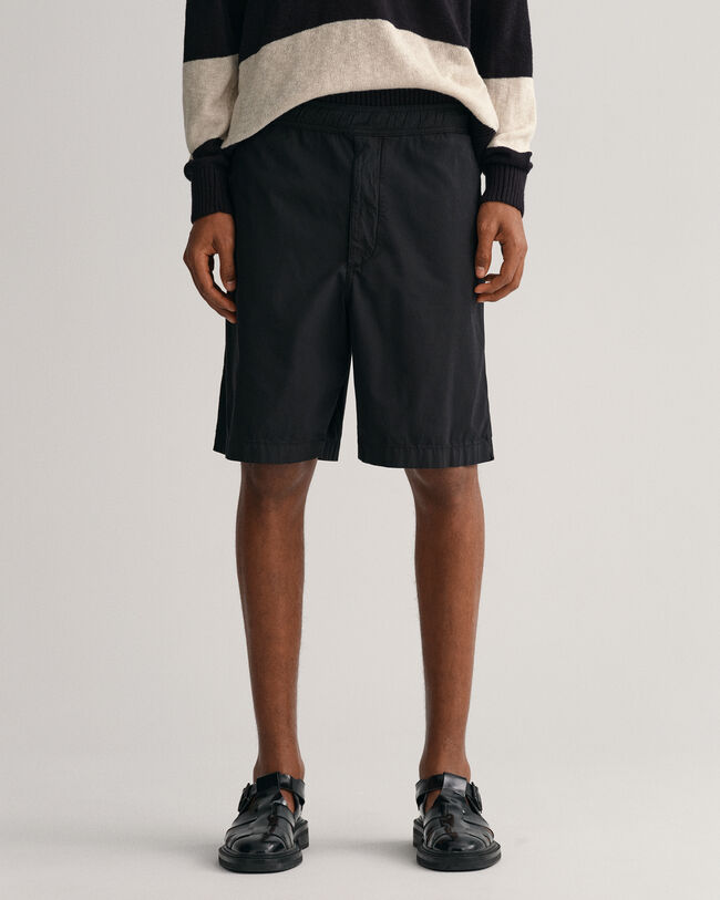 Sunfaded shorts med l&oslash;besnor