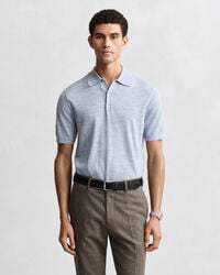 Kort&aelig;rmet polosweater af ekstra fin merinould