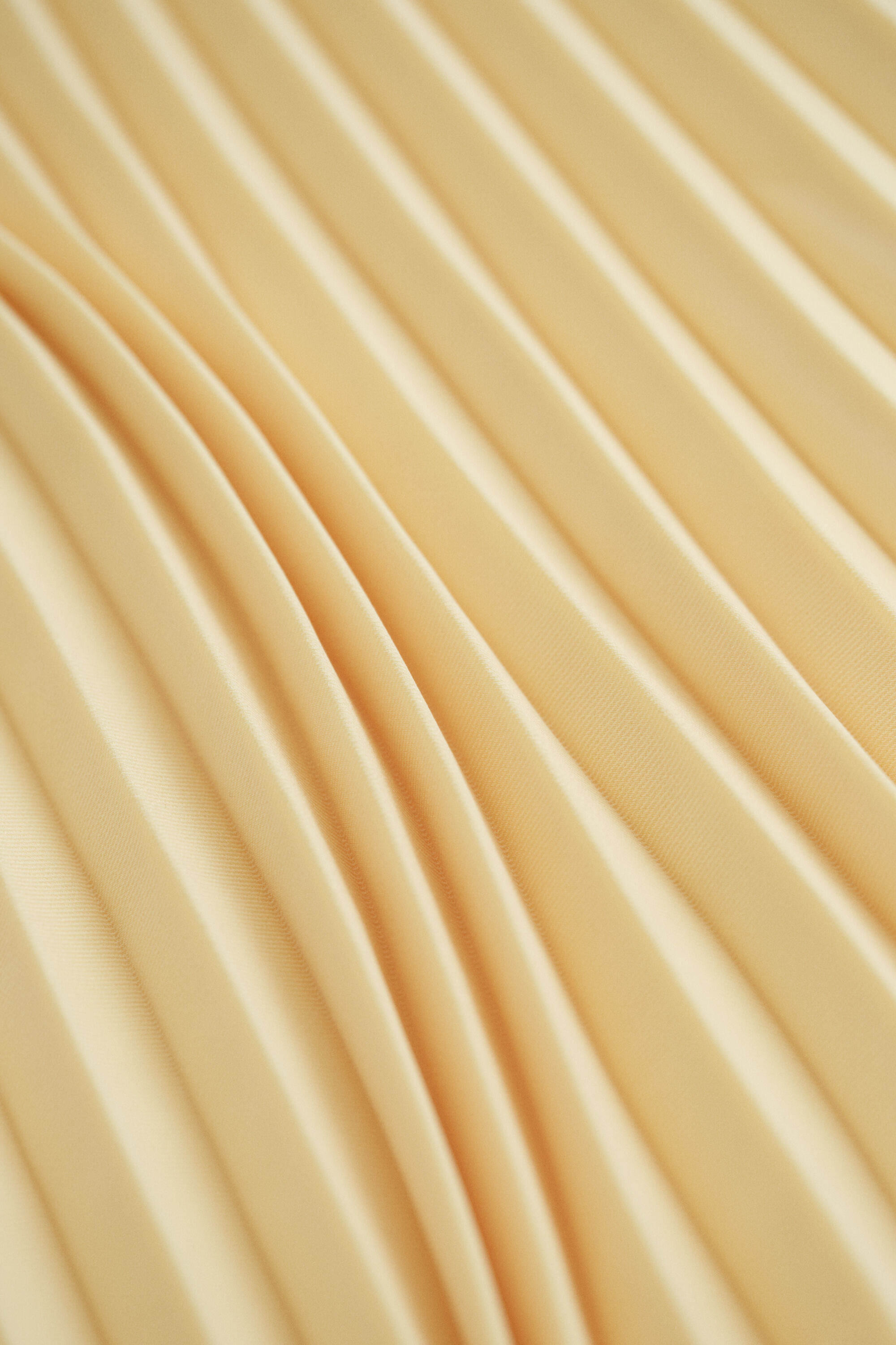 Plisseret midi-nederdel