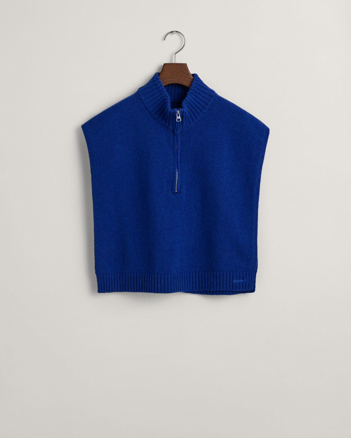 Uldstrikket forstykke med lynlås