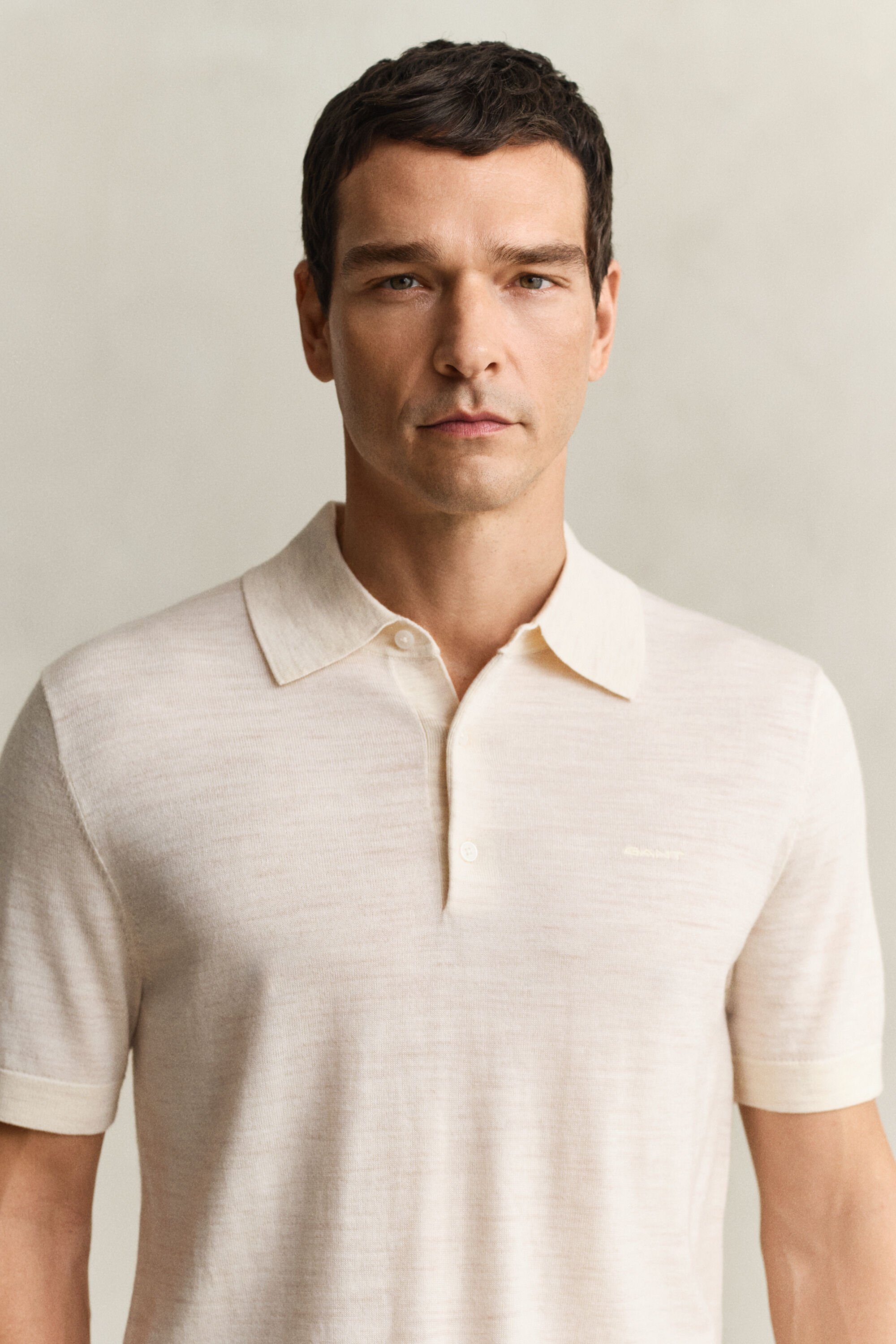 Kortærmet polosweater af ekstra fin merinould