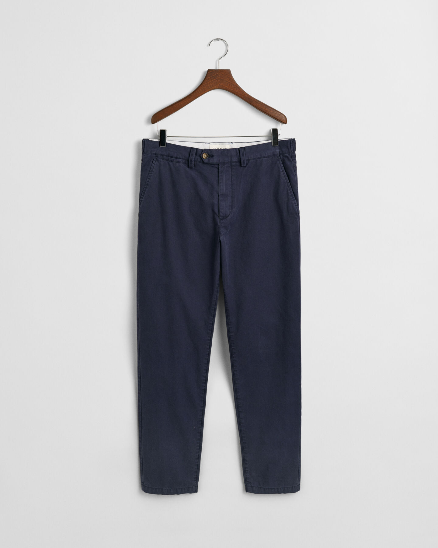 Regular fit tilspidsede chinobukser i lærred