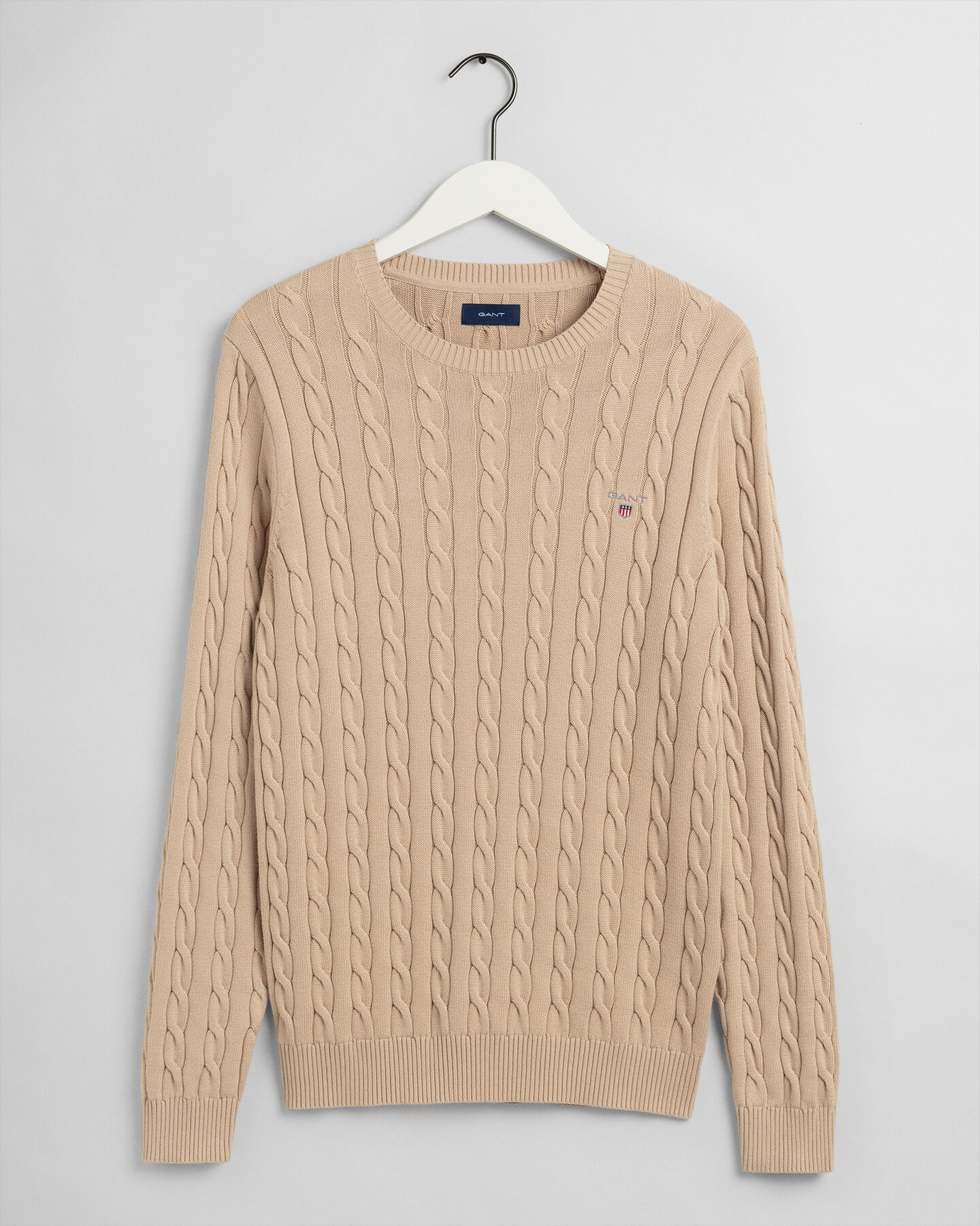 Crewneck sweater af bomuld med kabelstrik