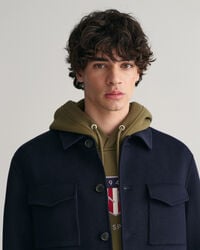 Håndsyet jakke med 4 lommer