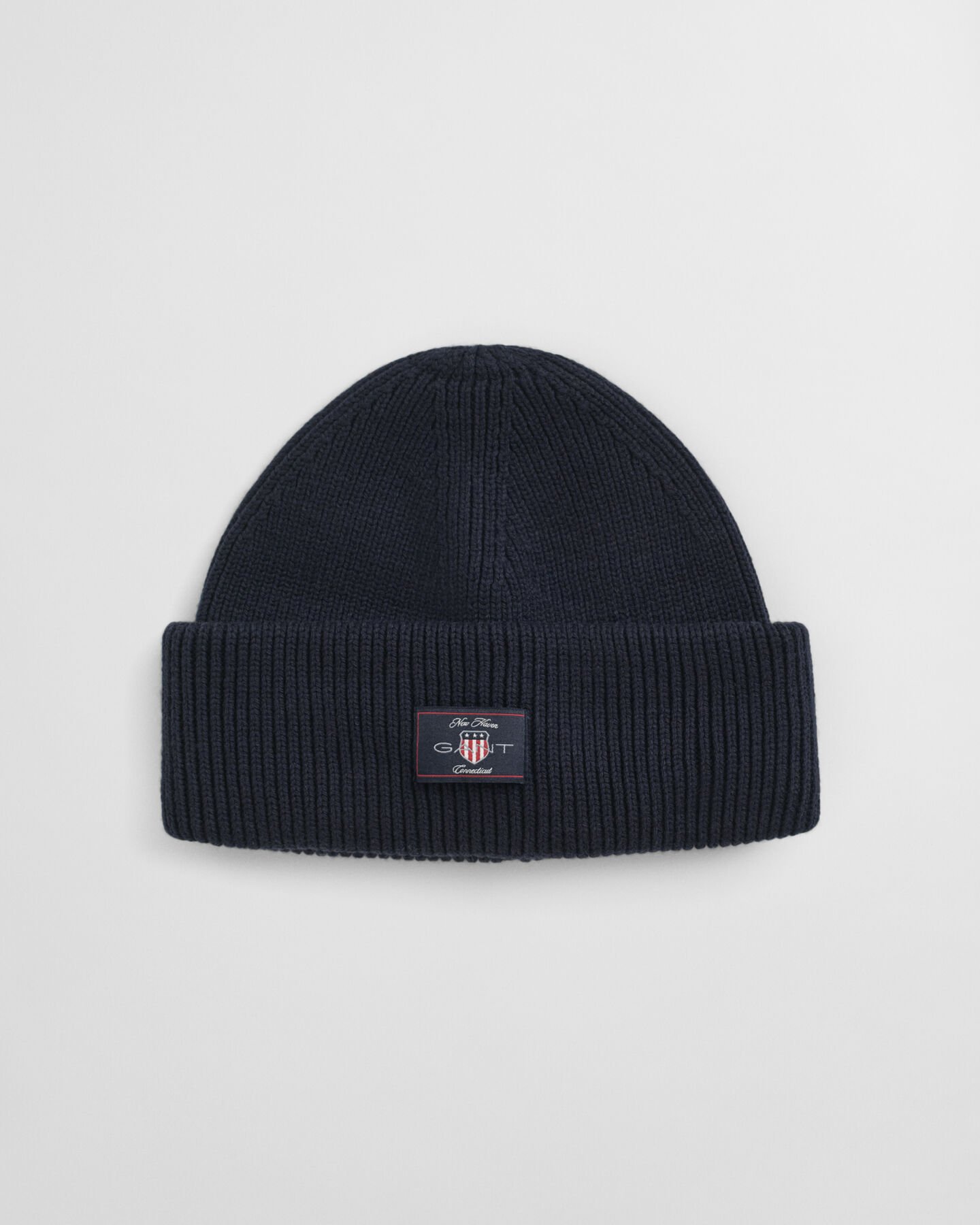 Ribstrikket beanie af bomuldsblanding