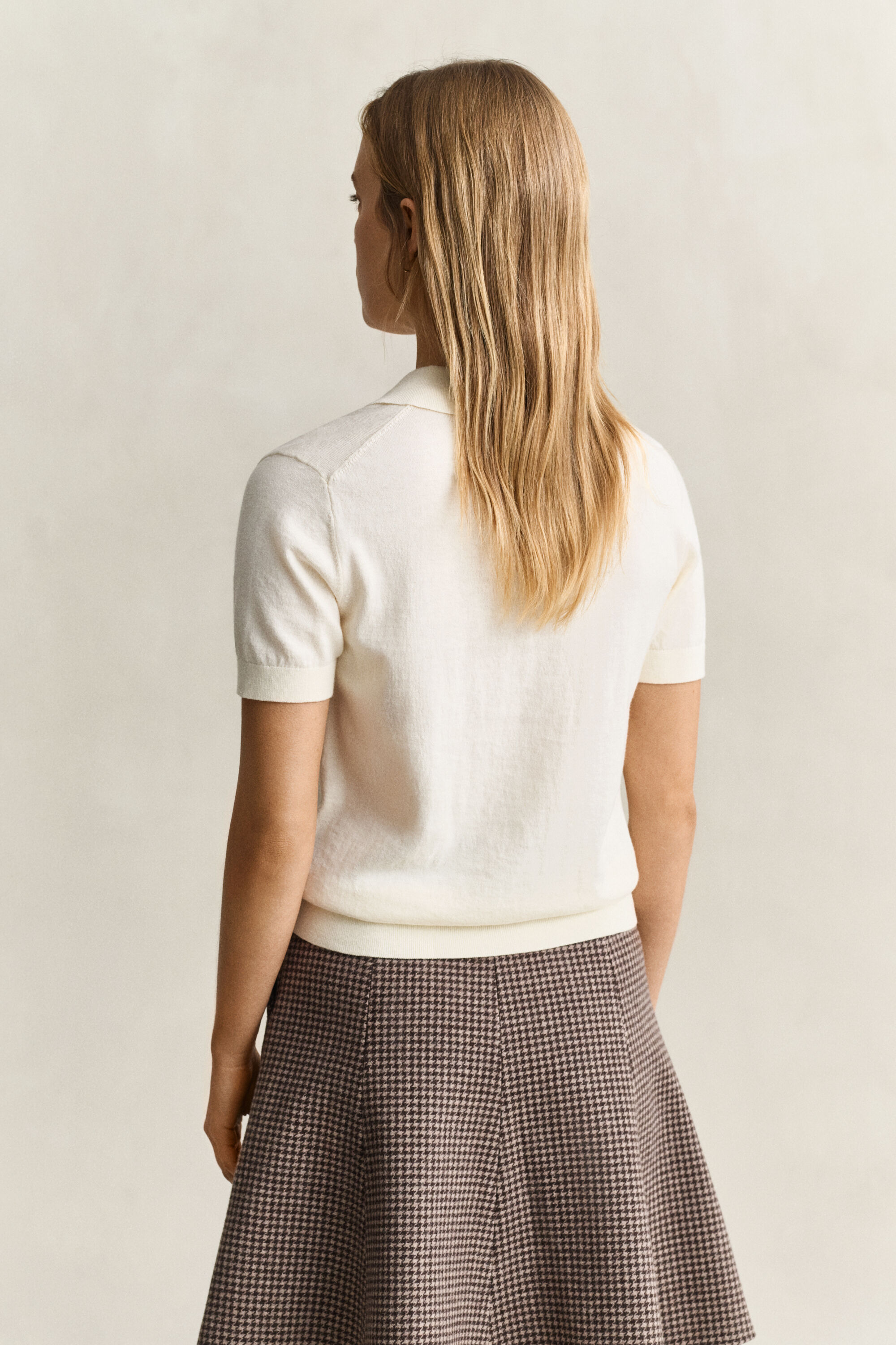 Let strikket polosweater