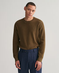 Ribstrikket crewneck sweater af bomuld og uld