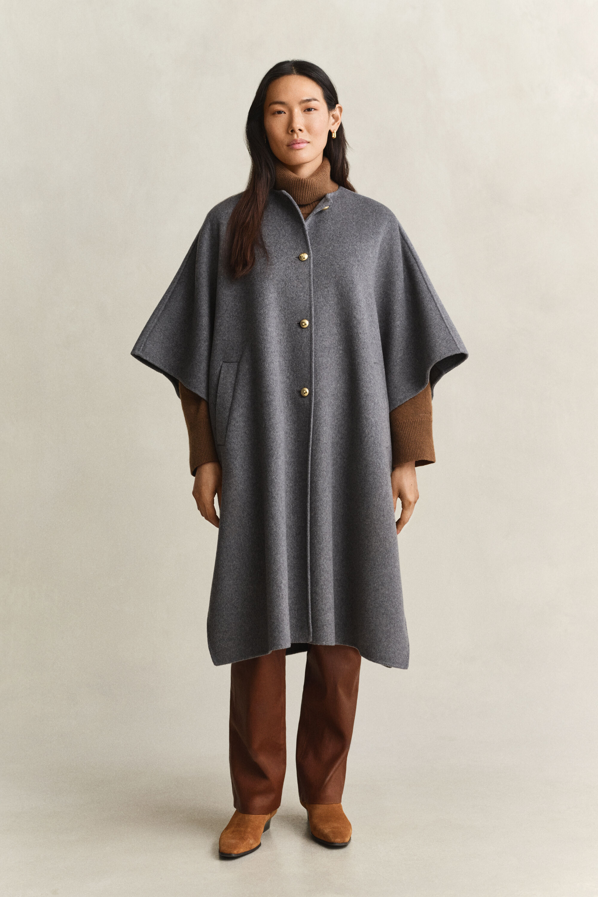 Håndsyet Cape Coat