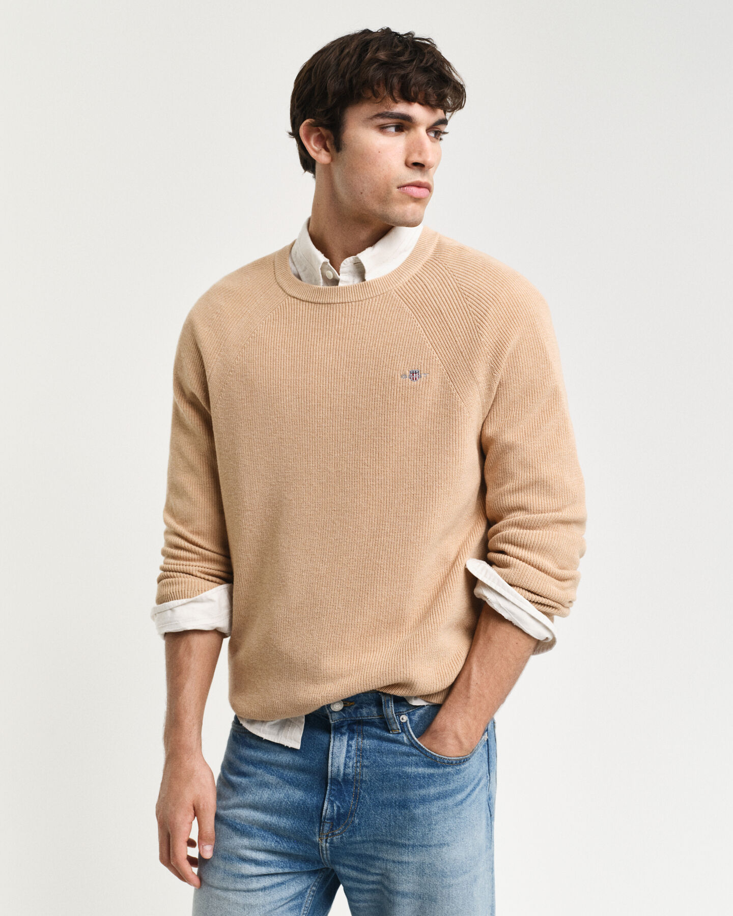 Ribstrikket crewneck sweater af bomuld og uld