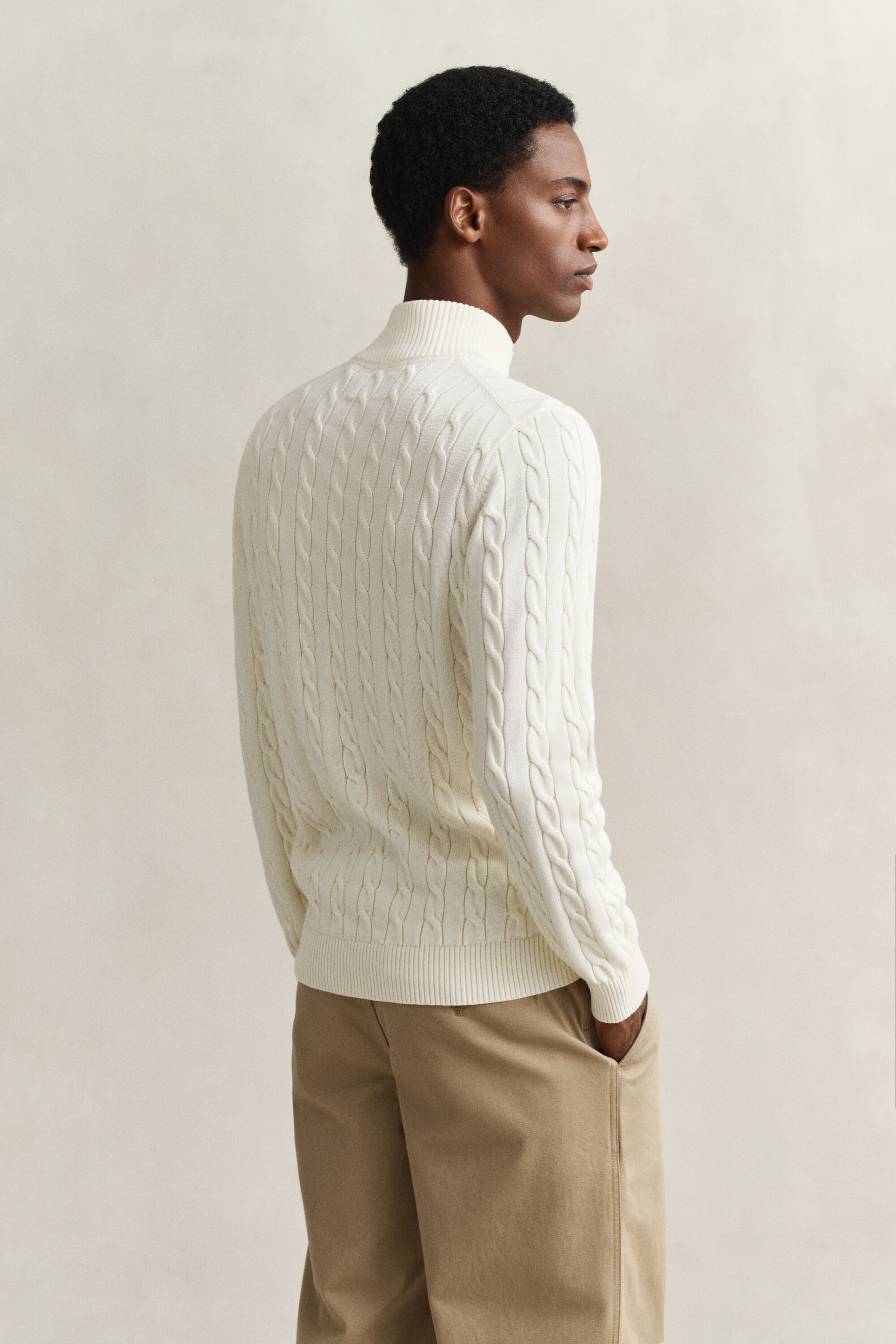 Kabelstrikket sweater af bomuld med halv lynlås