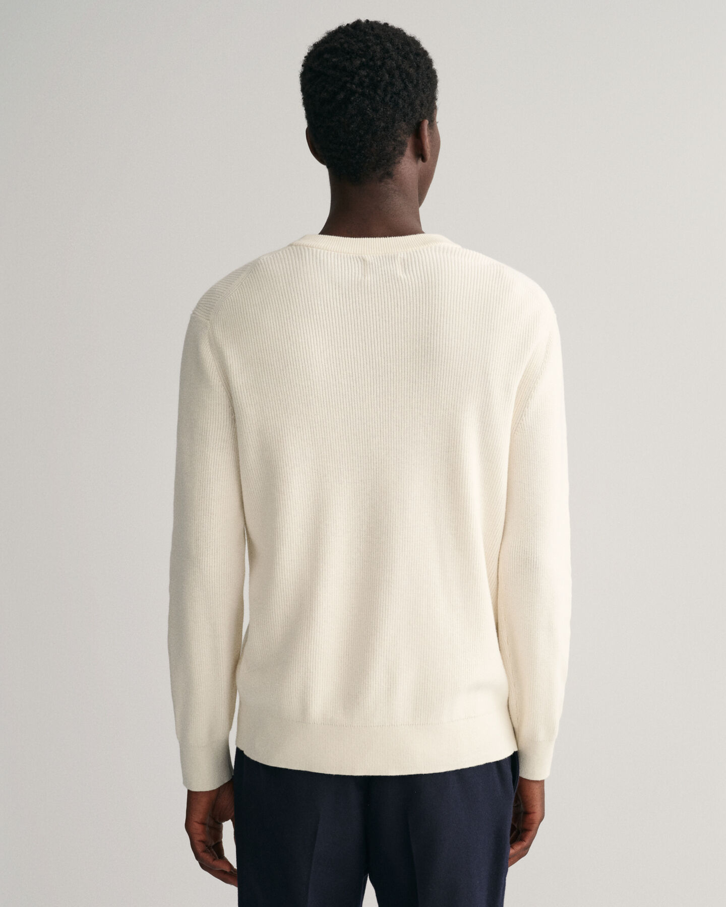 Ribstrikket crewneck sweater af bomuld og uld