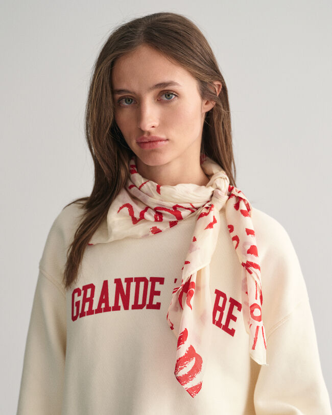 Tørklæde i bomuld og silke med trykt tekst