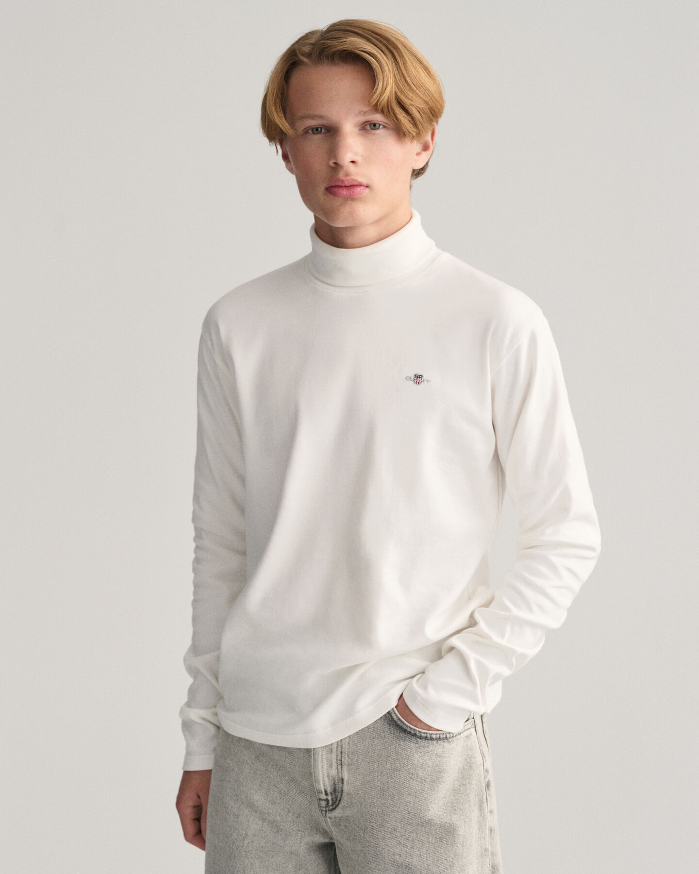 Teens Shield lang&aelig;rmet top med rullekrave