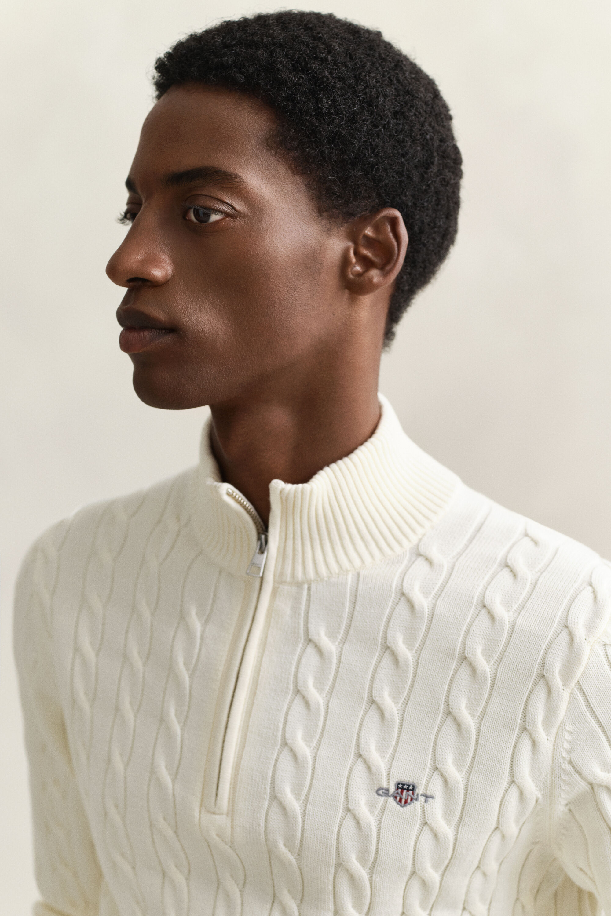 Kabelstrikket sweater af bomuld med halv lynlås