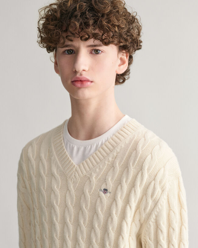 Teens Shield kabelstrikket sweater med V-hals