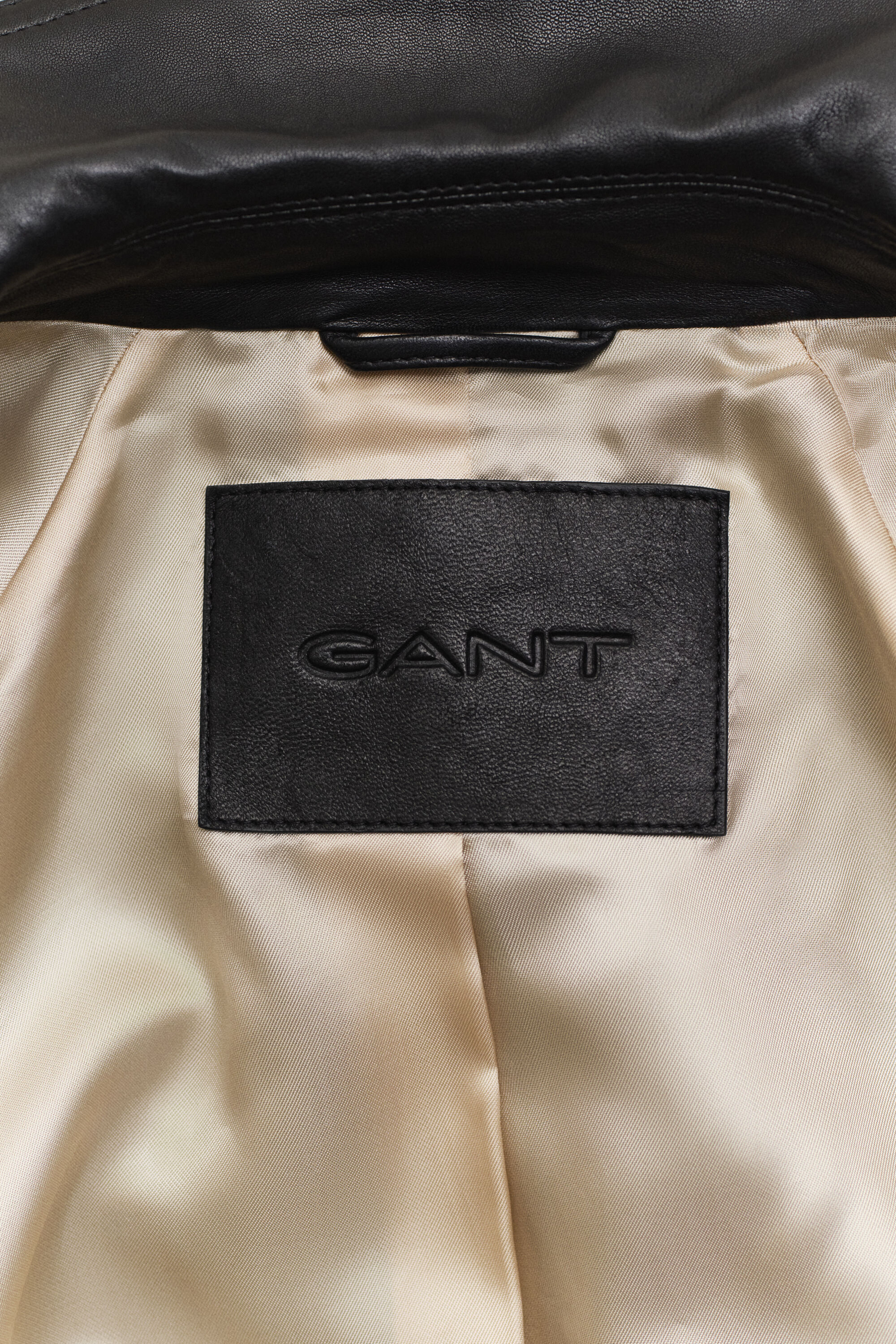 Kort trenchcoat i læder