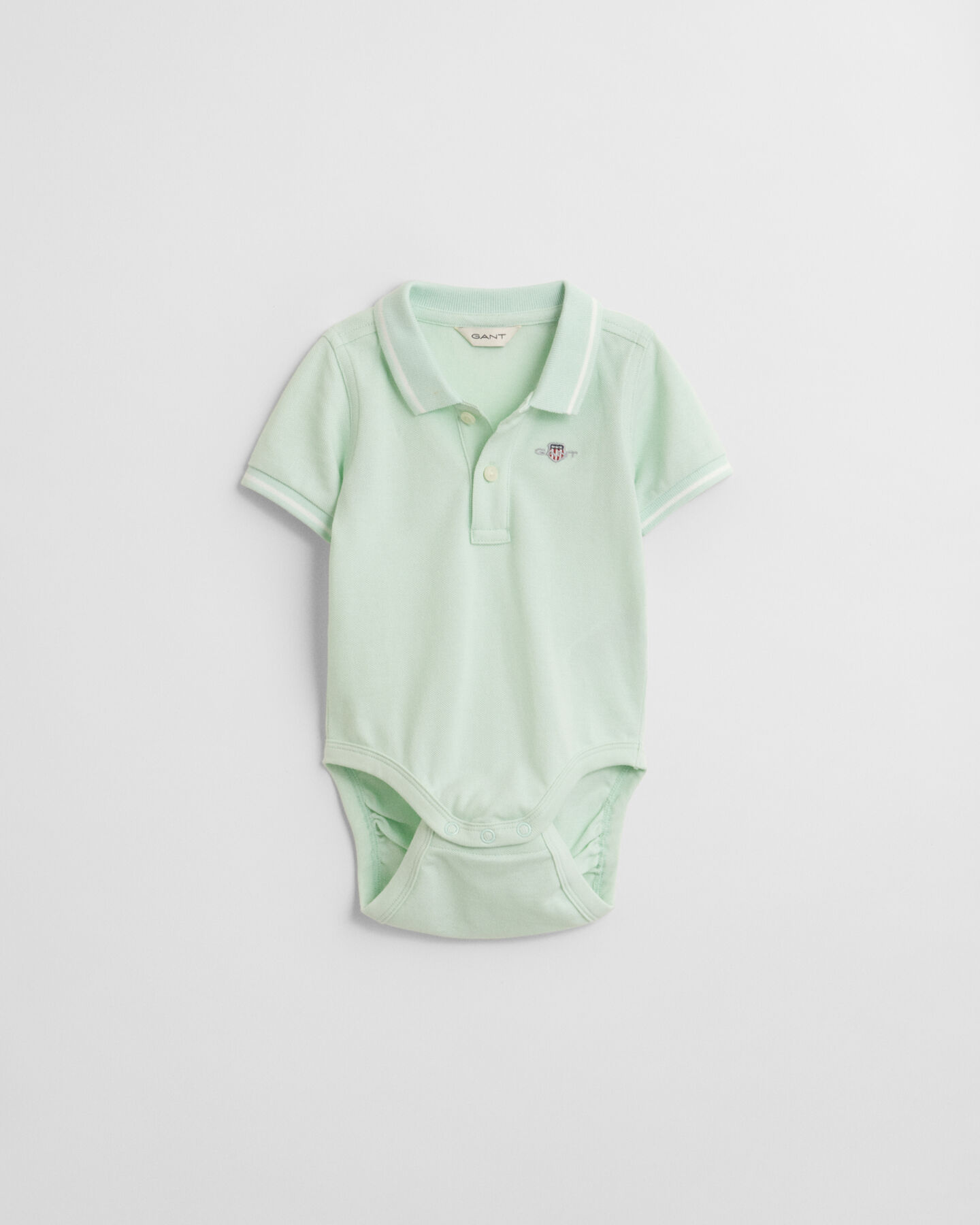 Baby piqu&eacute; bodysuit med kontrastfarvede striber