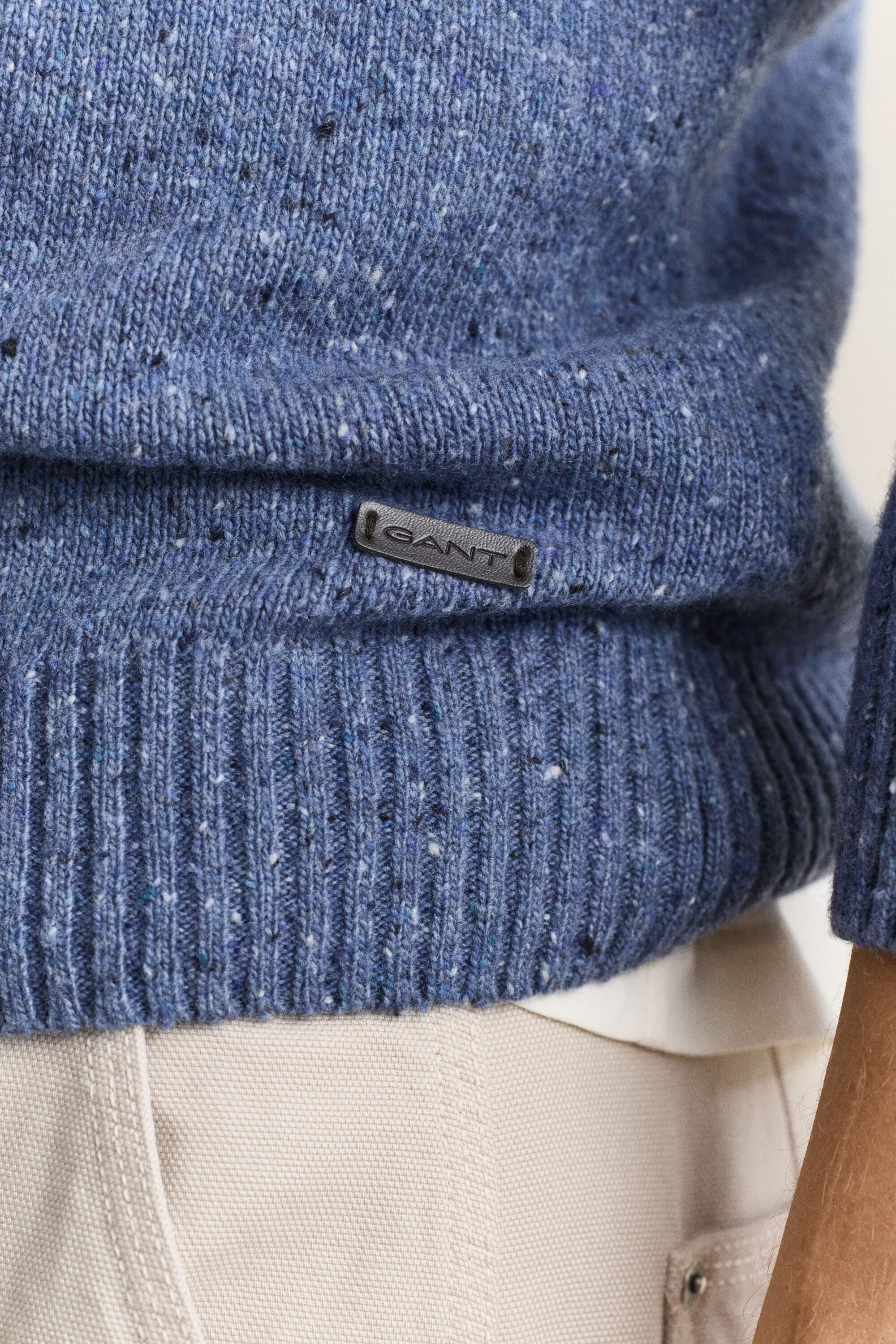 Polosweater i uldblanding med nister