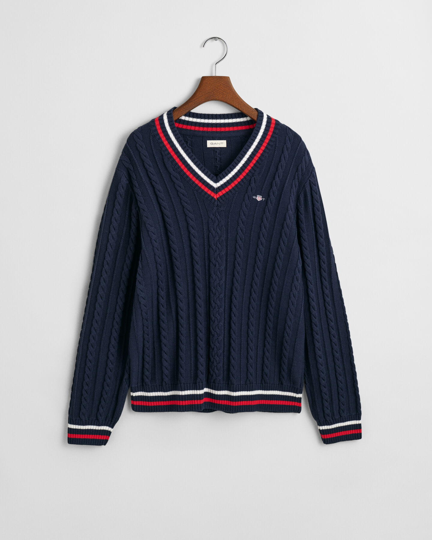 Teens kabelstrikket sweater med V-hals og striber