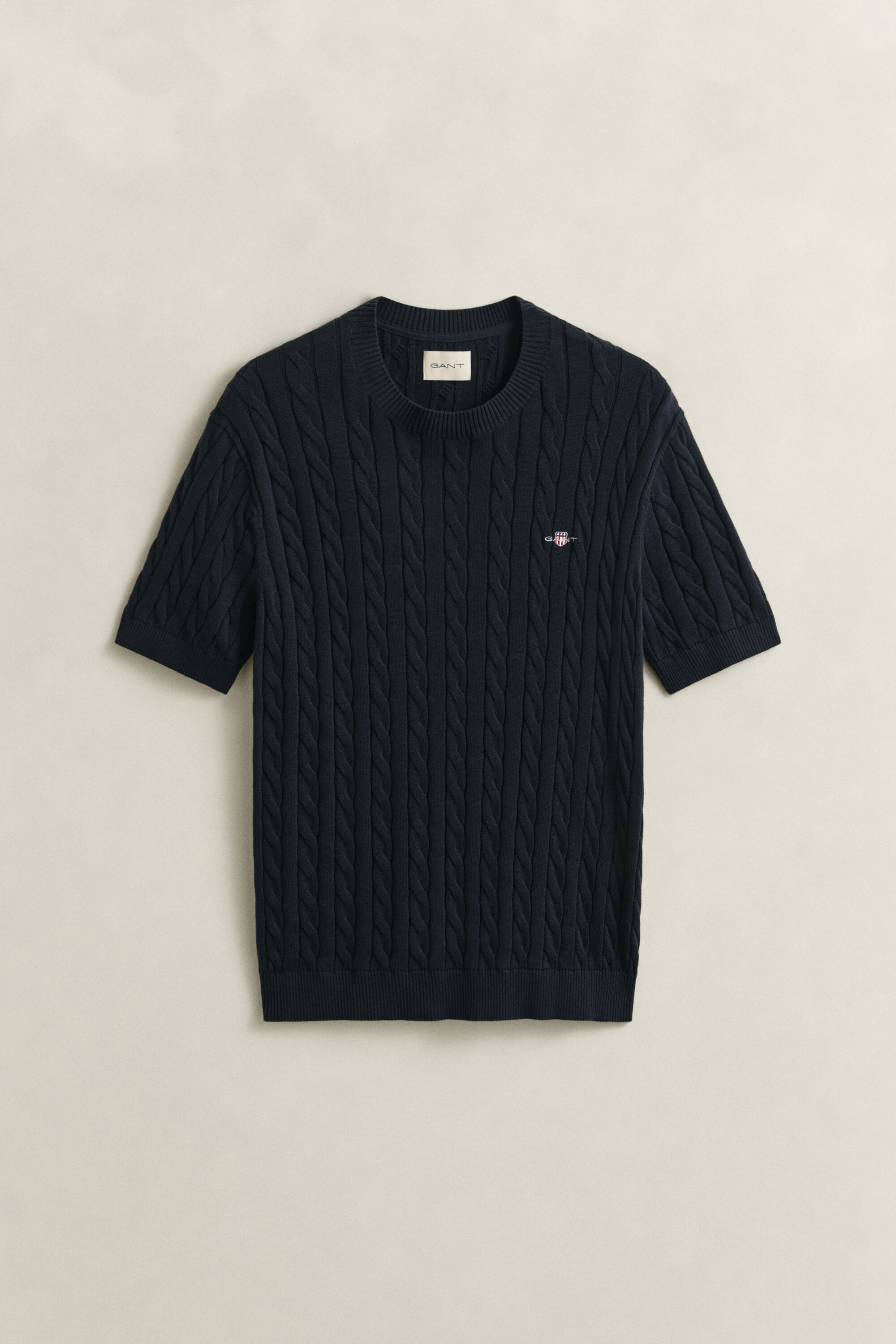 Kabelstrikket sweater i bomuld med korte ærmer