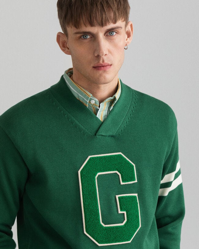 Collegiate sweater med V-hals