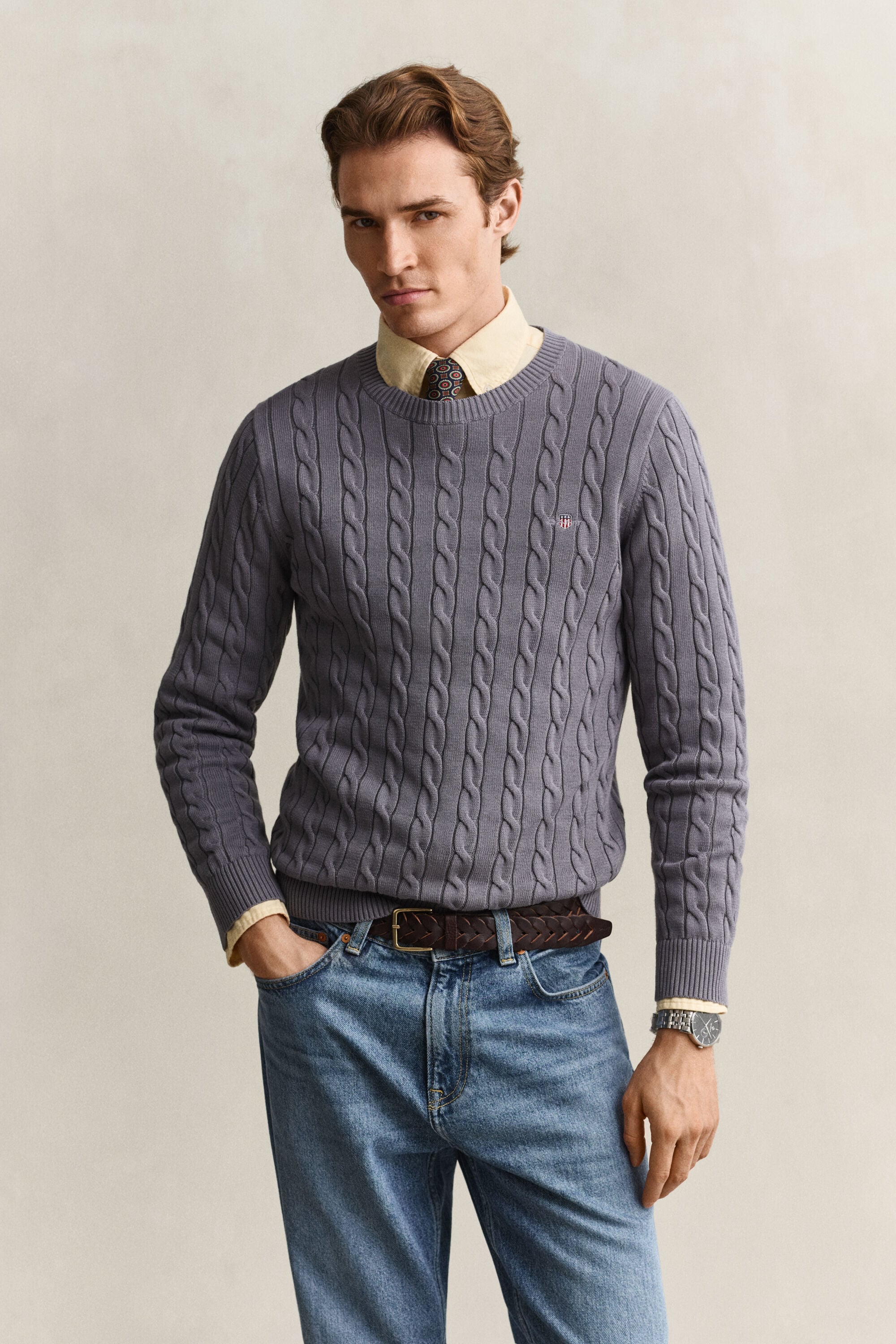 Crewneck sweater af bomuld med kabelstrik