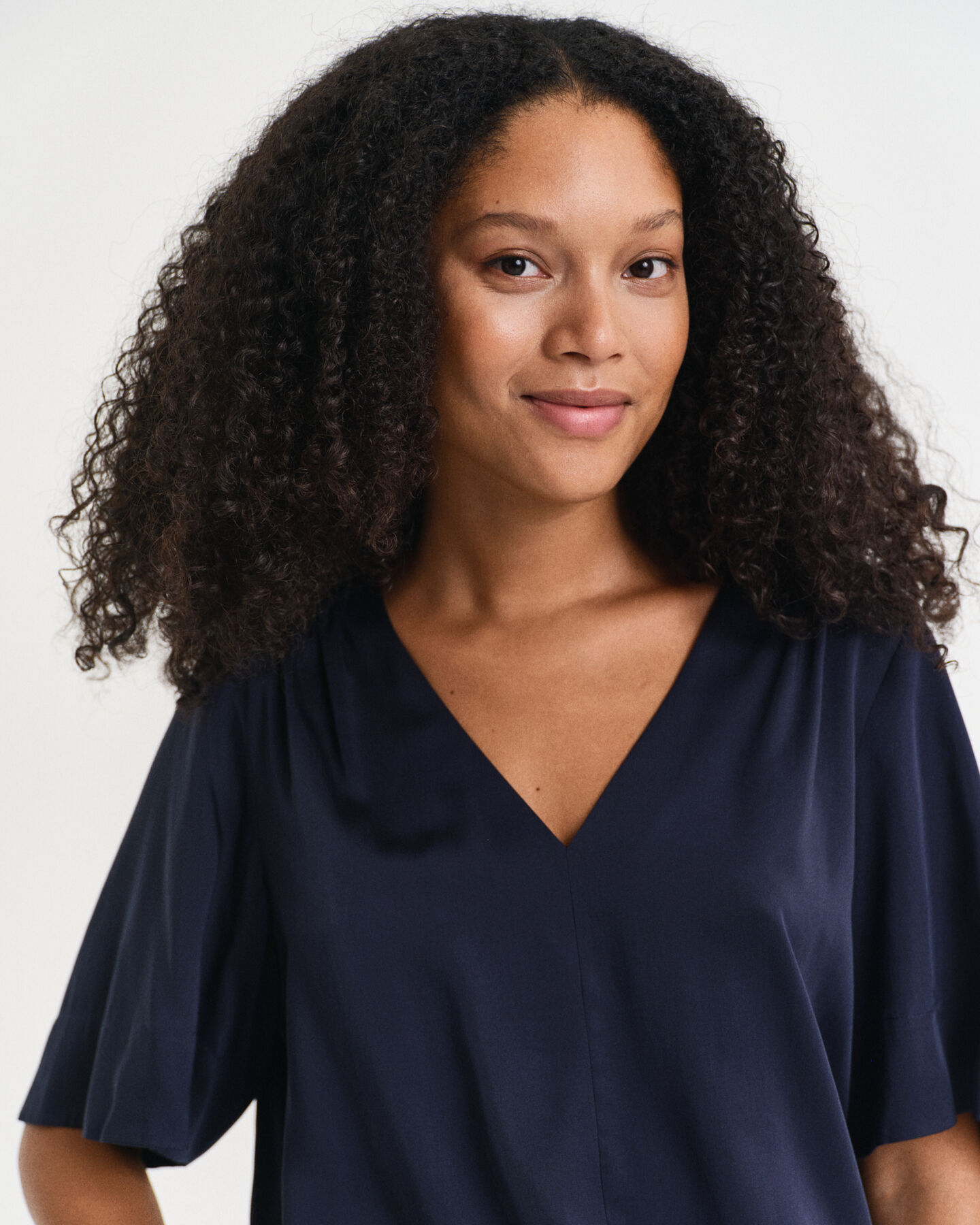 Bluse med korte ærmer