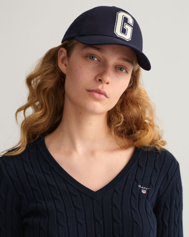 Kabelsweater af strækbomuld med V-hals