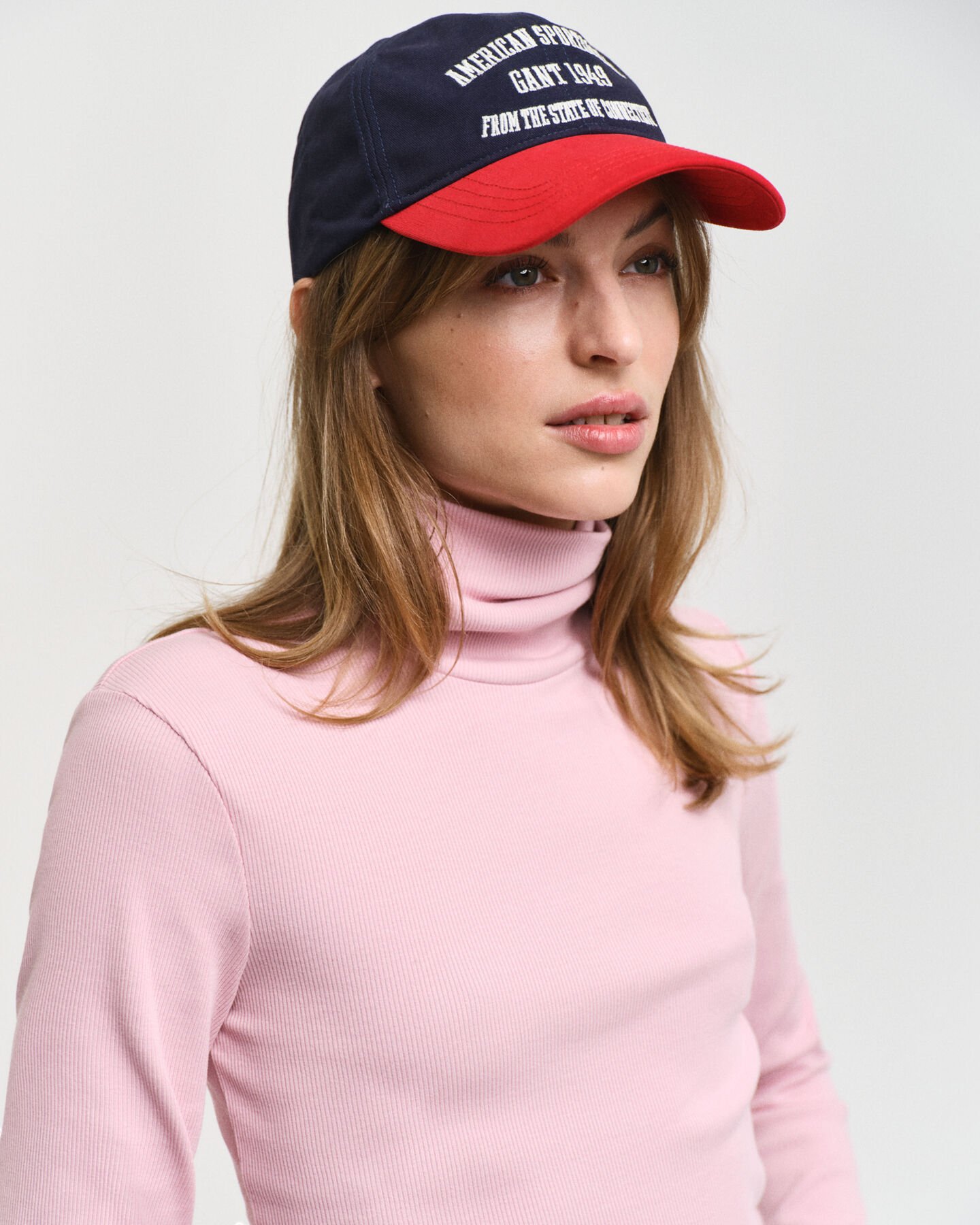 Ribstrikket langærmet top med rullekrave